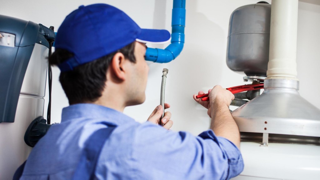 Plumber repairing an hot-water heater