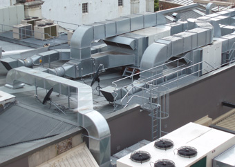 complex interconnecting air ducting on a roof top